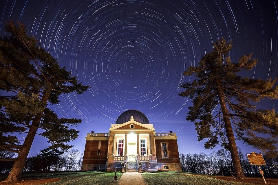 Cincinnati Observatory with swirling star sky